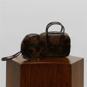 MINI CHARM BAG IN LEATHER