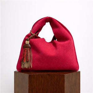 SMALL SLING BAG IN SUEDE