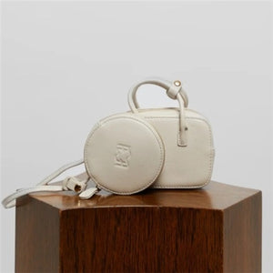 MINI CHARM BAG IN LEATHER