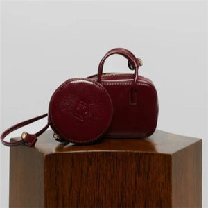 MINI CHARM BAG IN LEATHER