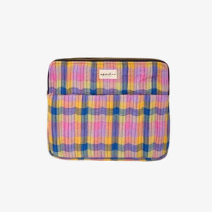 A quilted iPad sleeve featuring a vibrant multicolor plaid pattern with vertical wavy stripes in pink, yellow, blue, and purple. It has a top zipper closure and a small white brand label reading 'epauleta' on the front.