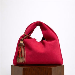 SMALL SLING BAG IN SUEDE